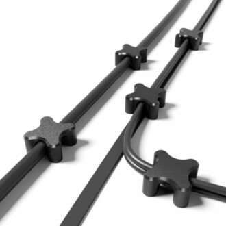 Black cable organizers on wires.