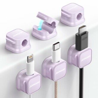 Purple cable organizer clips with various cable types